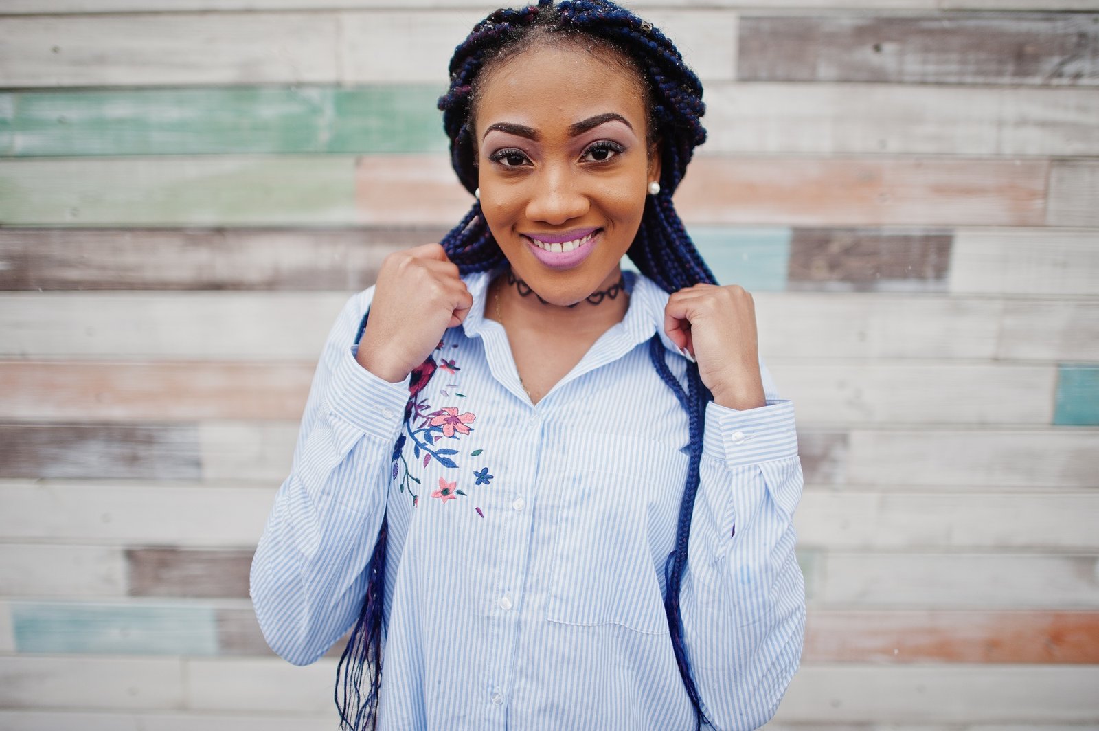 Stylish african american girl with dreads